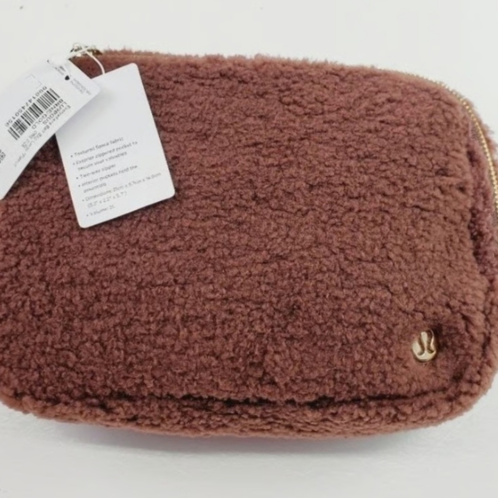 lululemon athletica Brown Clutch with Soft Plush Material